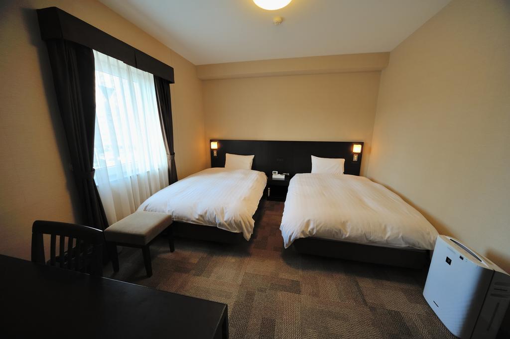 Dormy Inn Express Koriyama Rum bild
