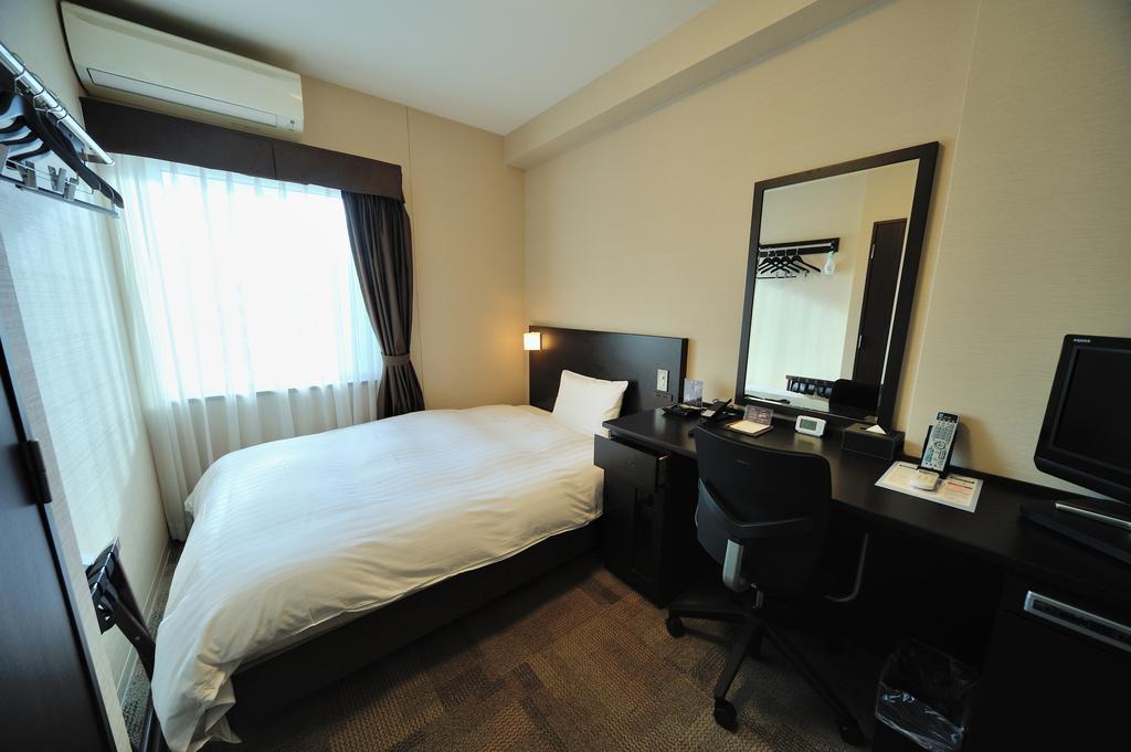 Dormy Inn Express Koriyama Rum bild