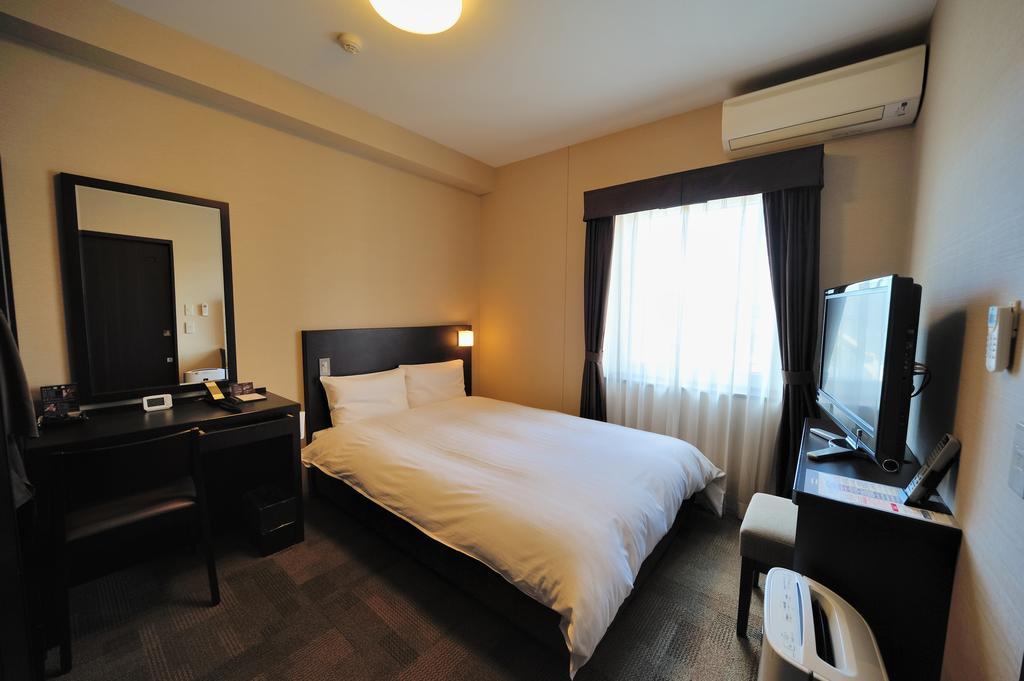 Dormy Inn Express Koriyama Rum bild