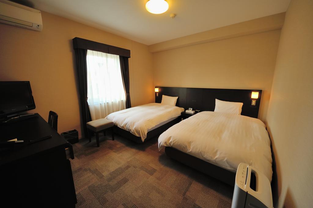 Dormy Inn Express Koriyama Rum bild